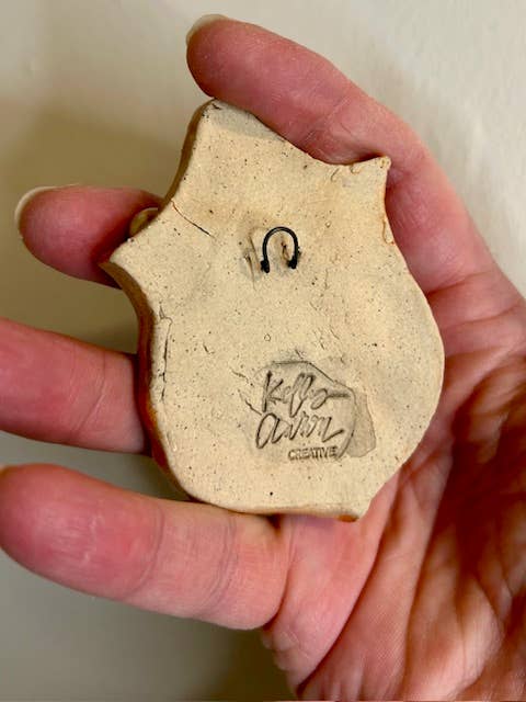 Cat on a Plaque