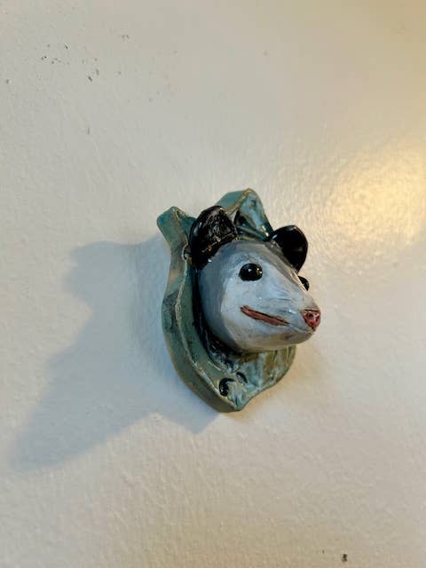 Opossum on a Plaque