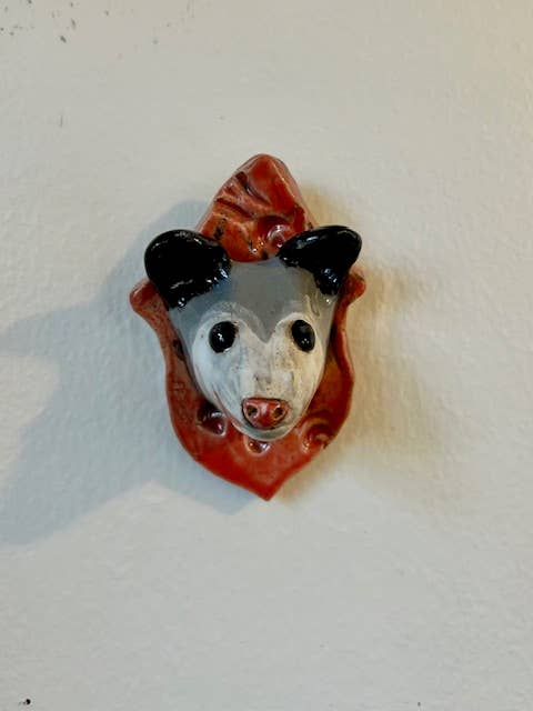 Opossum on a Plaque