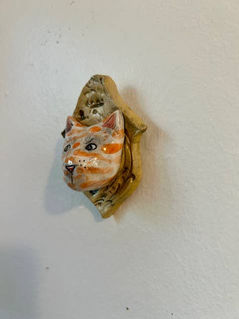 Cat on a Plaque